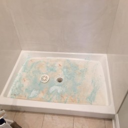 dirty shower floor before cleaning
